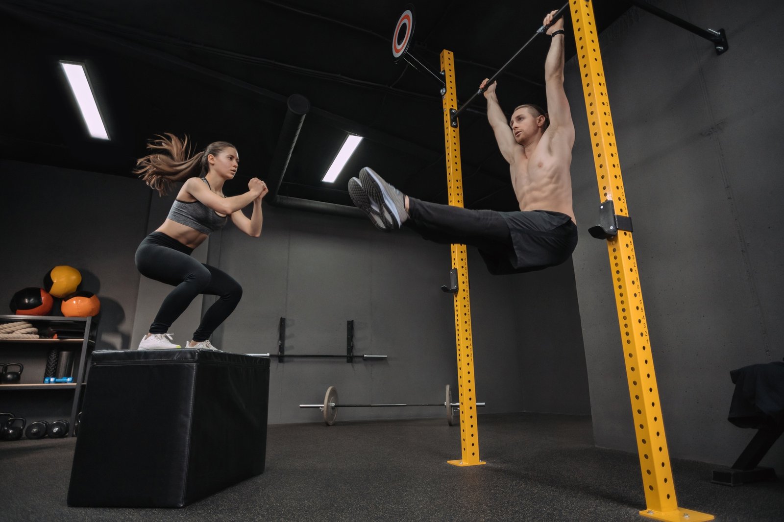 Couple have crossfit training at gym together